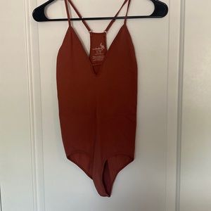 Burnt orange free people bodysuit